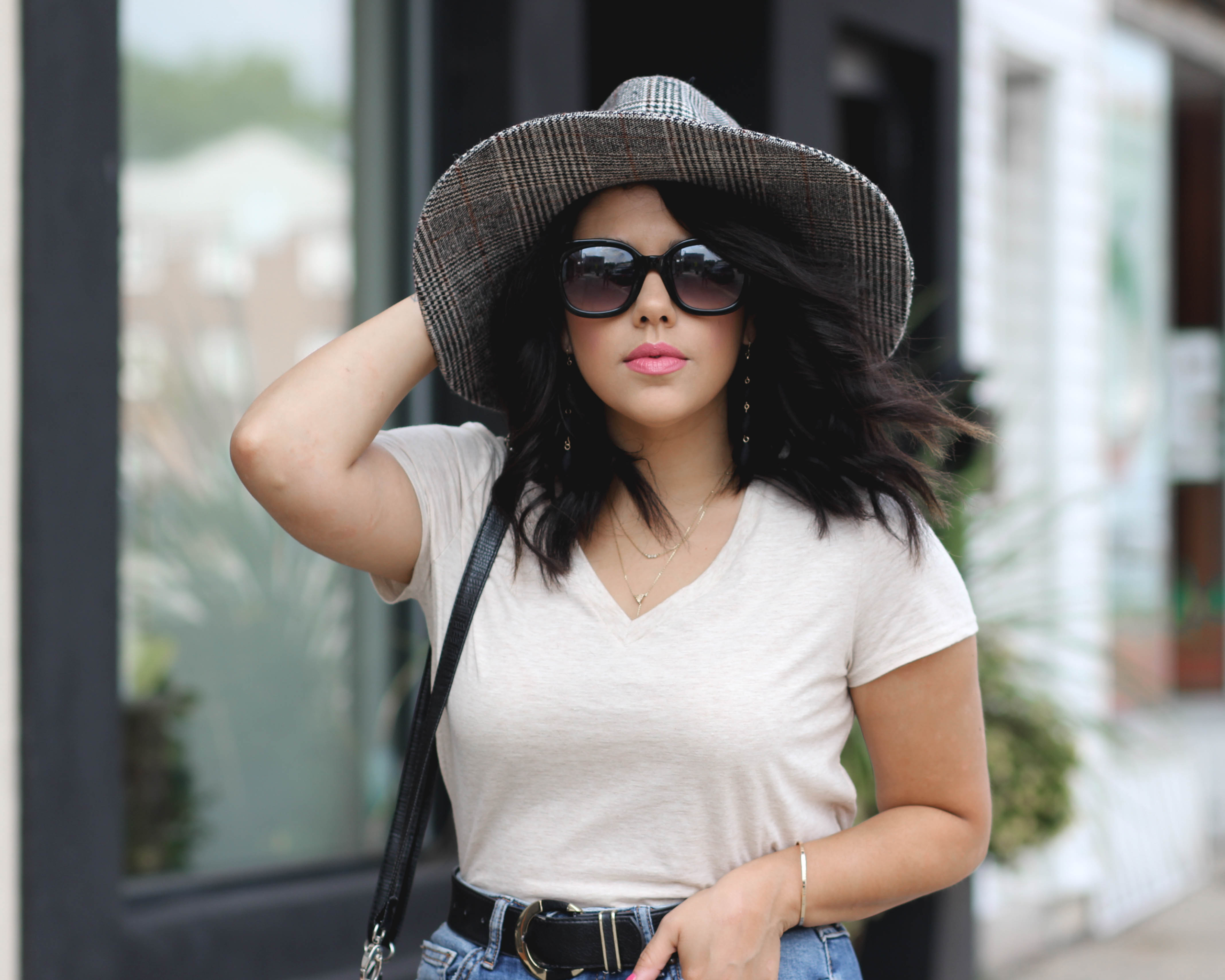 close up of lifestyle blogger naty michele wearing a wide brim hat 