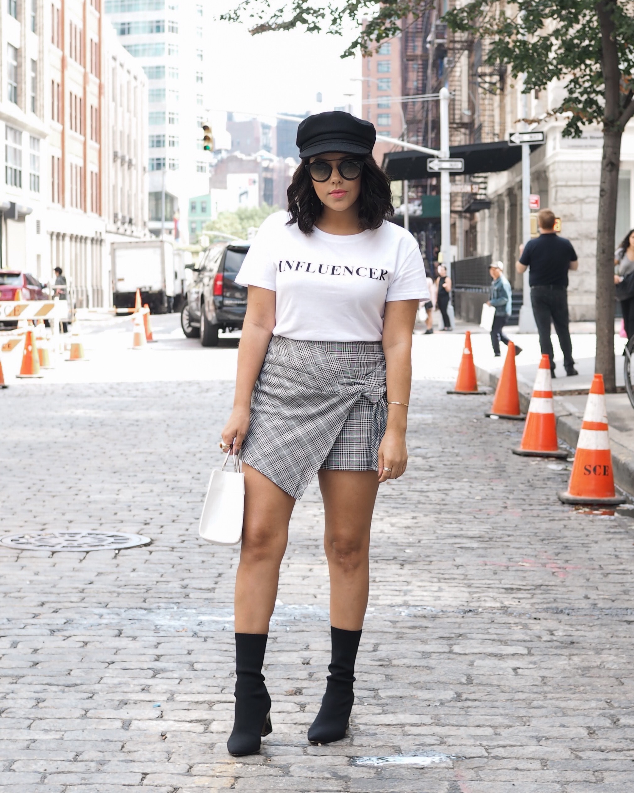 naty michele wearing influencer tee and sock boots at nyfw