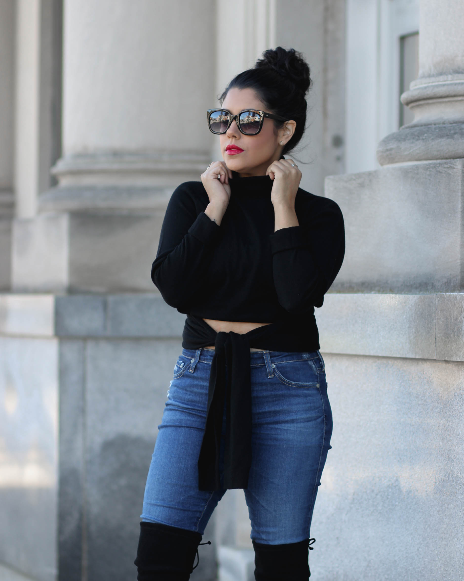 lifestyle blogger naty michele wearing a kendall and kylie sweater with her hair in a bun