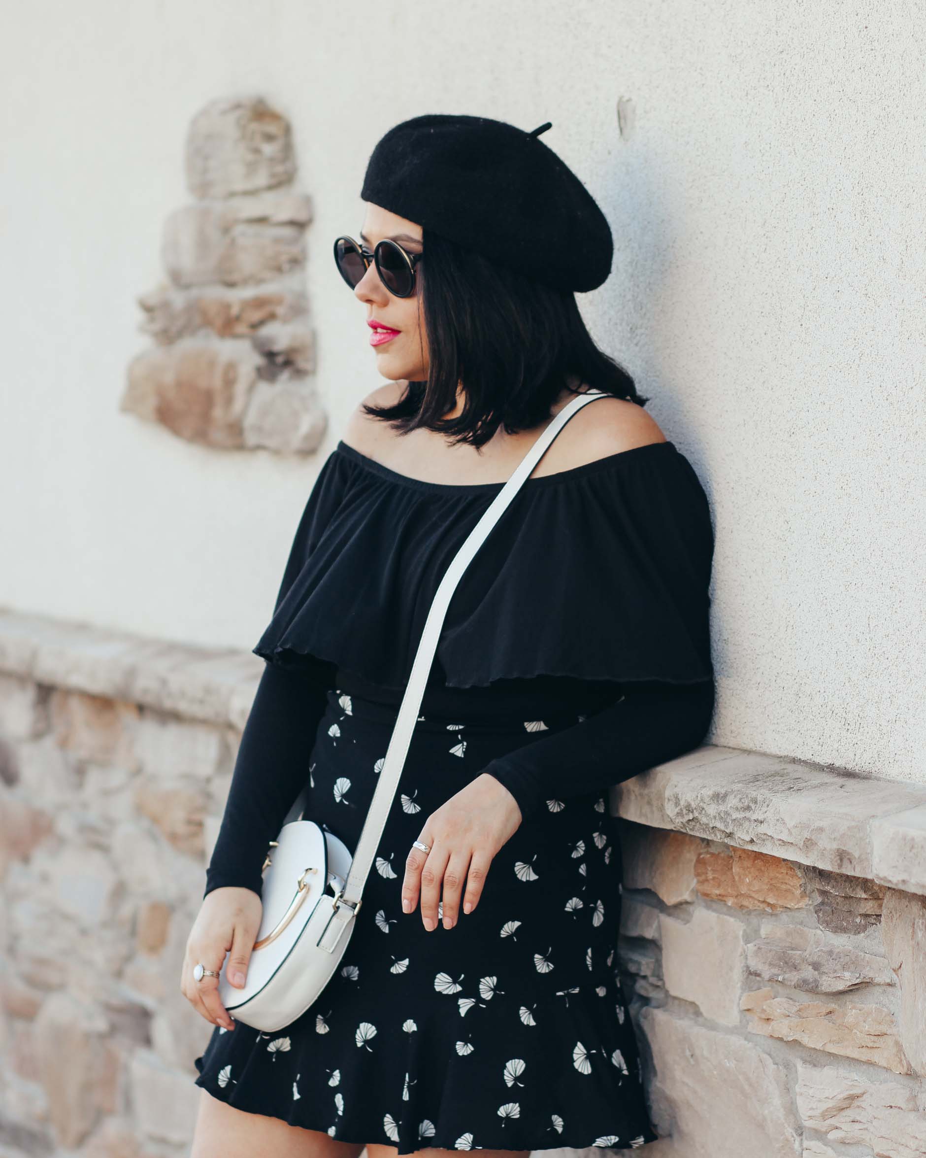 naty michele wearing a beret and off the shoulder top 