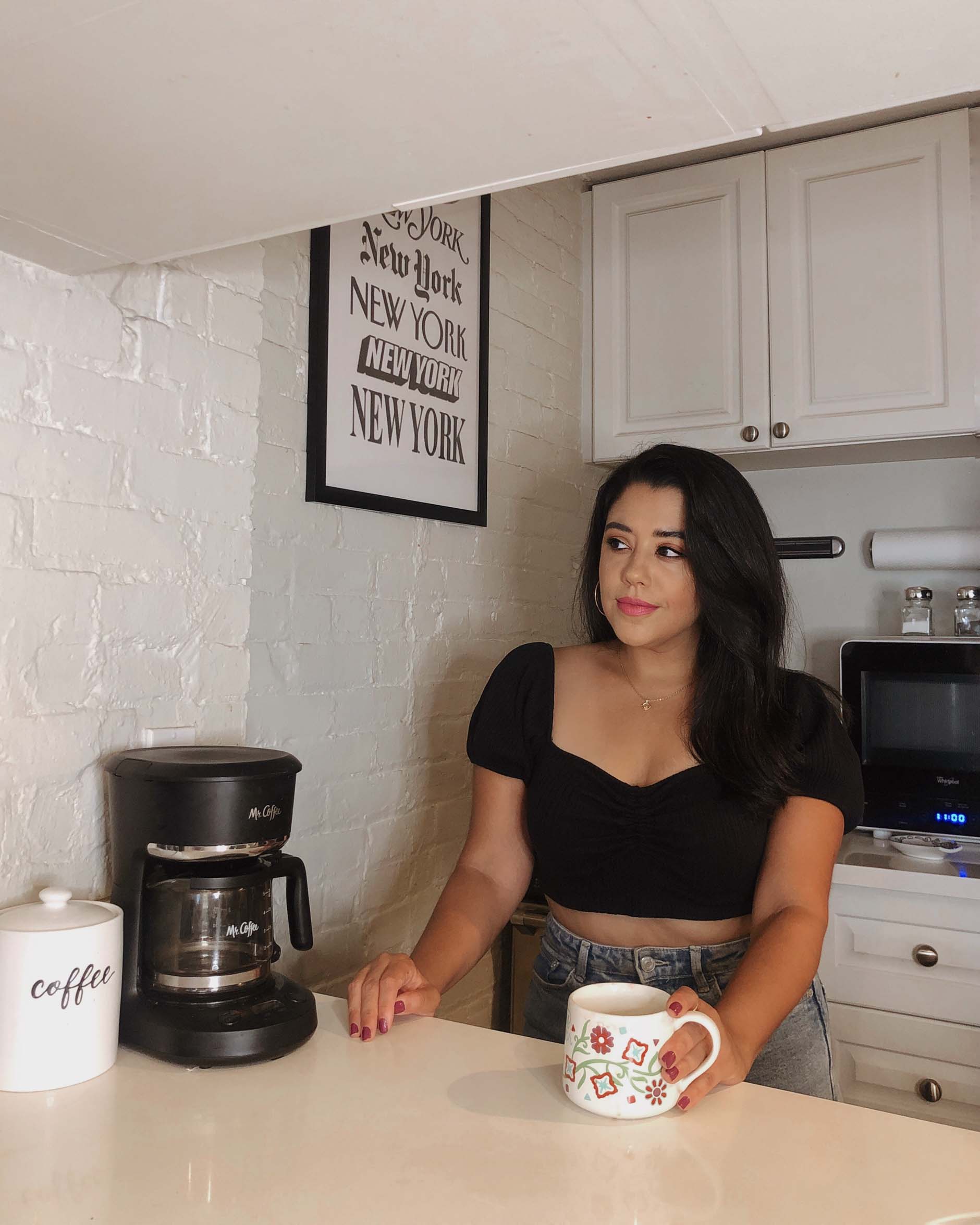 naty michele drinking coffee in nyc apartment