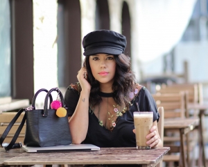 lifestyle blogger naty michele with iced latte