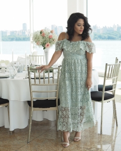 naty michele wearing a long mint lace green