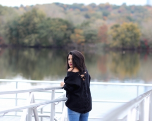 Lifestyle Blogger Naty Michele wearing a back lace-up sweater