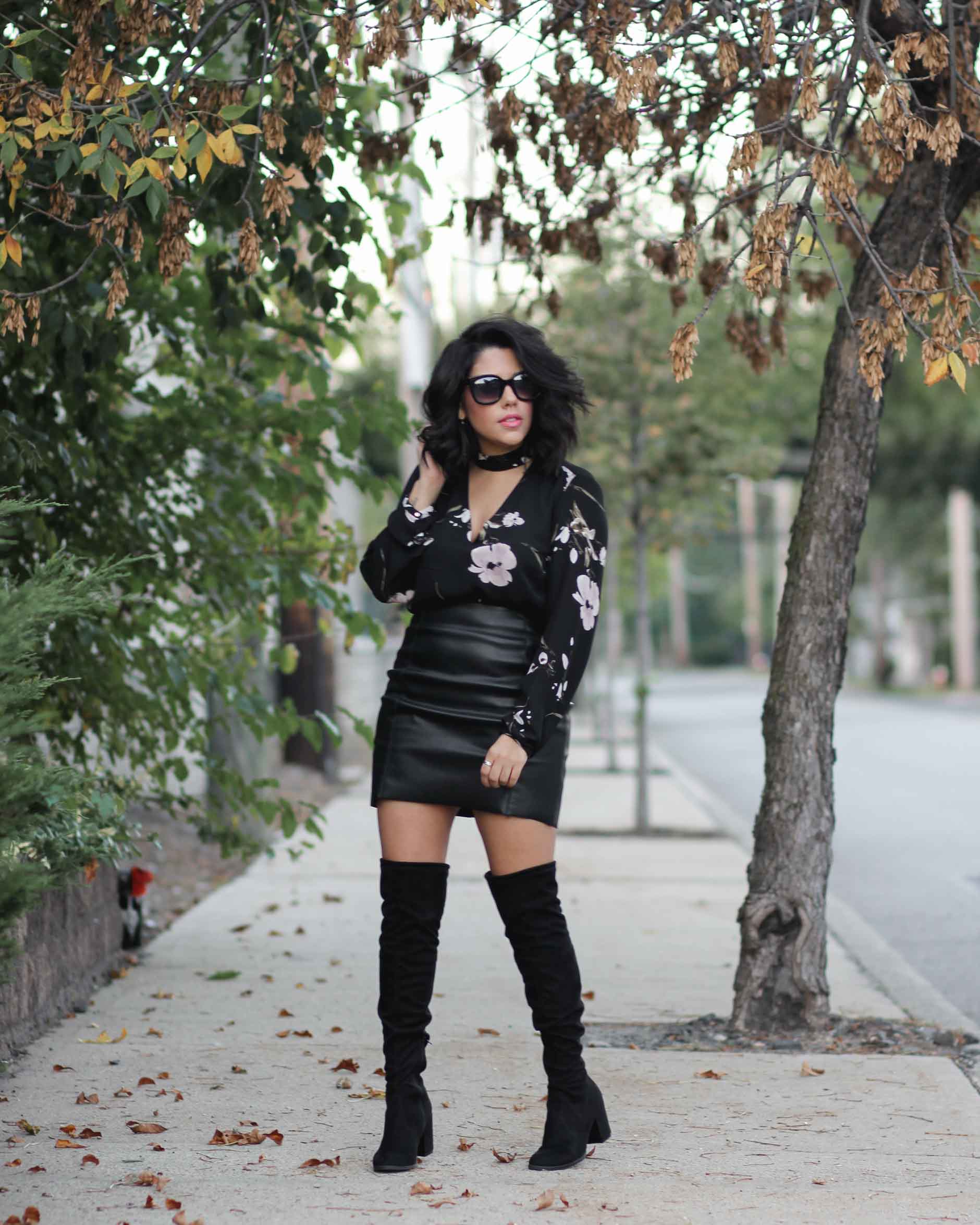 lifestyle blogger naty michele wearing OTK boots and a leather skirt
