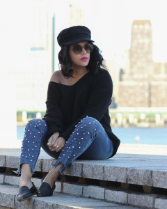 lifestyle blogger naty michele wearing pearl jeans and a black sweater