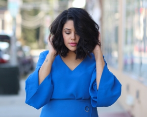 lifestyle blogger naty michele with short curly hair