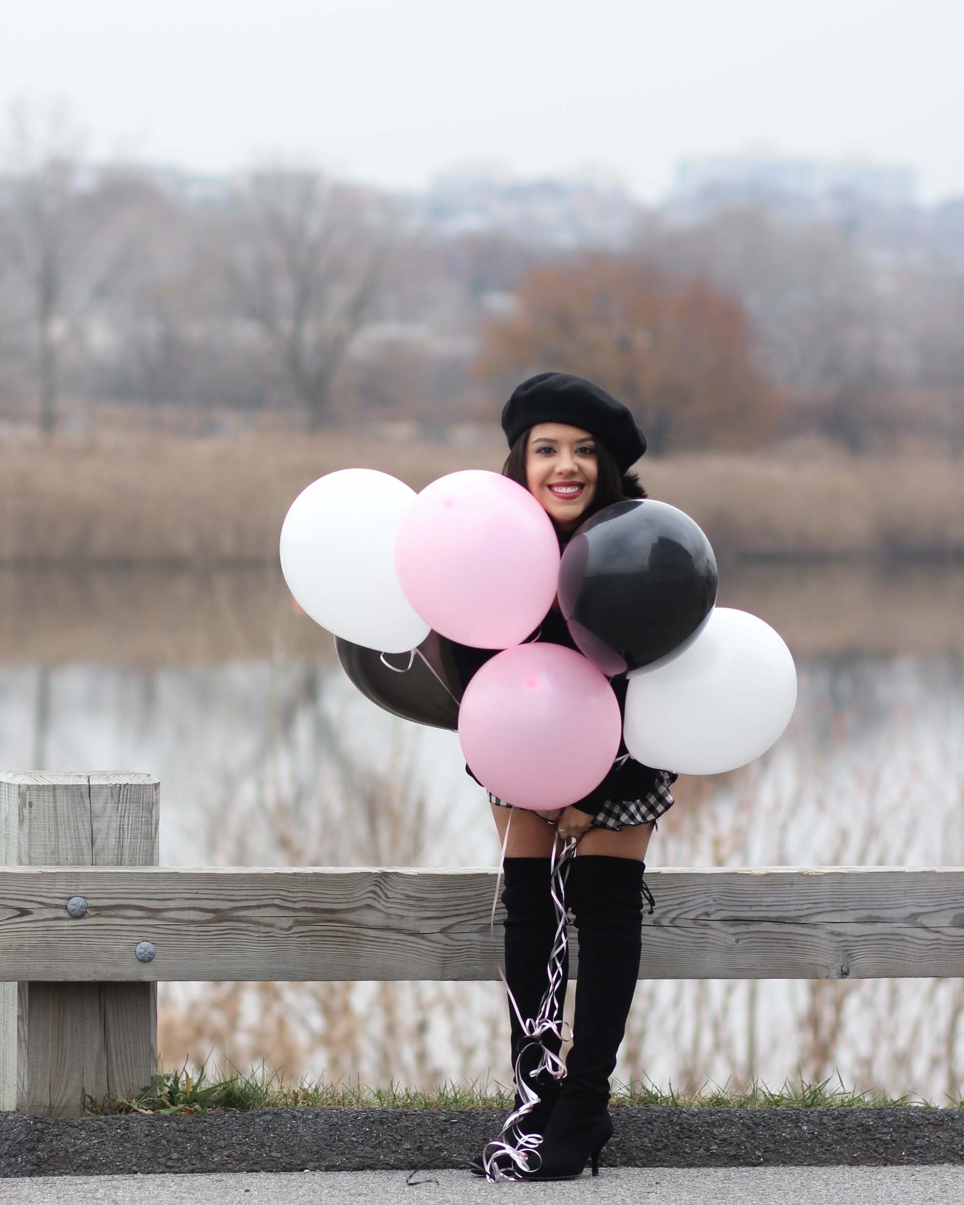 lifestyle blogger naty michele wearing beret with balloons 