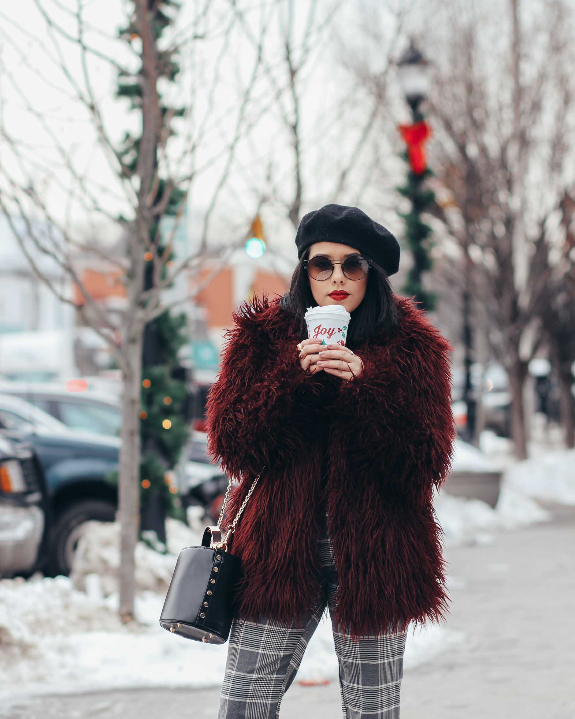 lifestyle blogger naty michele wearing faux fur coat and beret