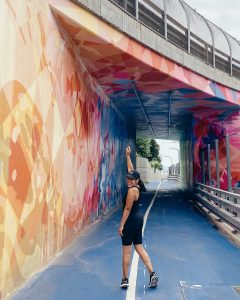 naty michele running on cuomo bridge